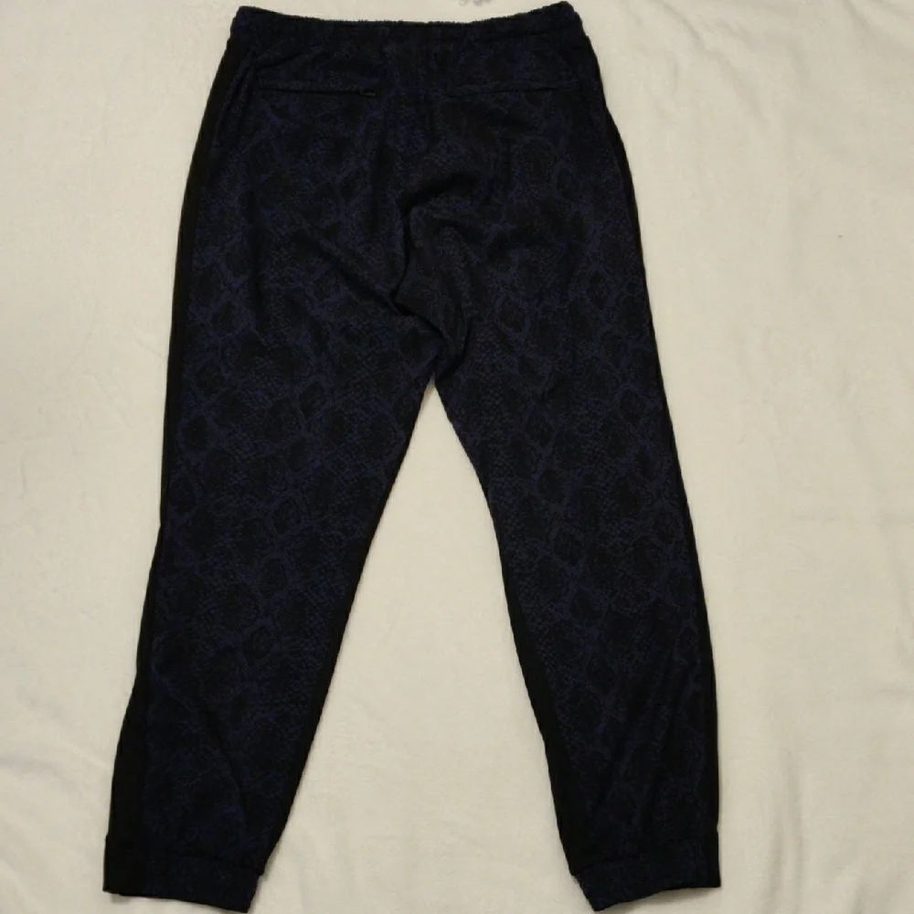 ATHLETA. Men's Black and Blue Patterned Pants